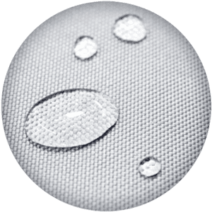 Close-up image of water droplets on a textured, gray fabric surface, demonstrating water resistance. The droplets vary in size, with some larger and others smaller, highlighting the fabrics hydrophobic quality.