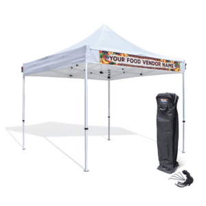 A 10'x10' Commercial Pop Up Canopy Tent in white, featuring a customizable front sign to display Your Food Vendor Name. It is set up on a flat surface and comes with a black carrying case and stakes for easy setup.