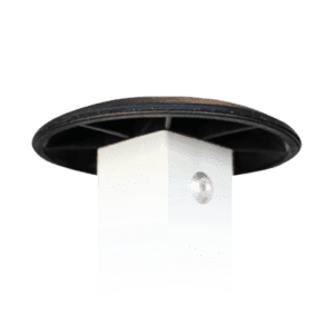 Close-up of a white cylindrical object with a round black top and a small metallic button on the side, set against a plain white background.
