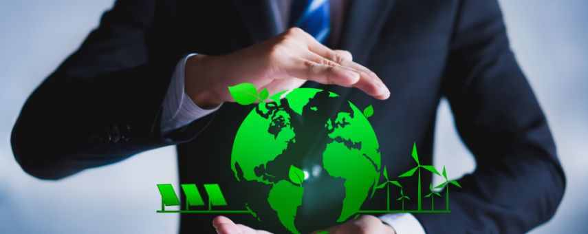 A person in a suit gently holds a green globe with plant leaves sprouting from it. Below the globe are icons of solar panels and wind turbines, symbolizing renewable energy and environmental conservation.