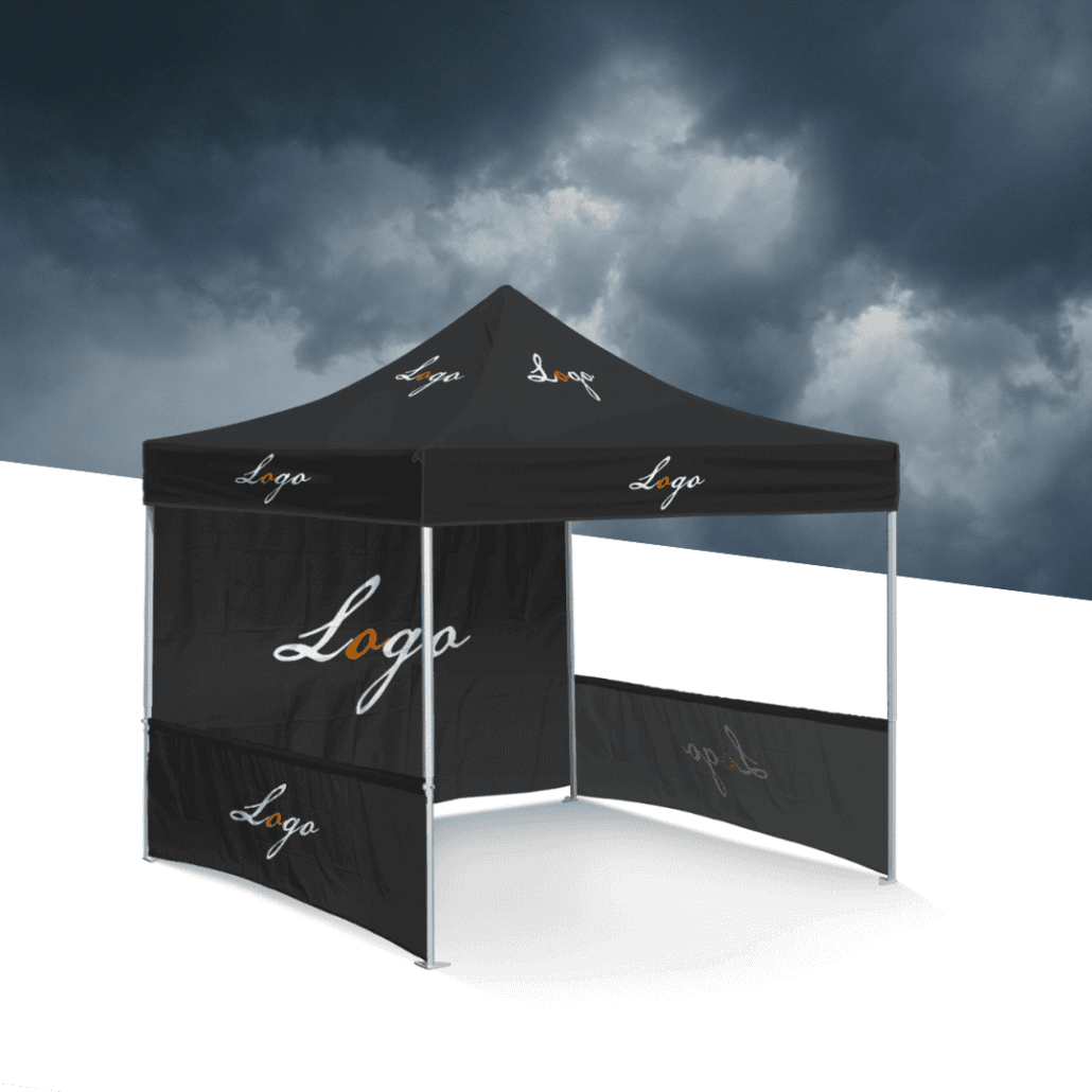 A black canopy tent with "Soccer Tents" logo printed in white and orange sits against a dramatic cloudy background.
