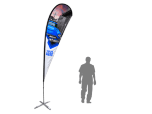 A 15ft Tear Drop Flag featuring a car image and "Your Logo Here" text displayed on a sleek, black pole. Standing on a silver cross base, the flag is accompanied by a silhouetted figure for scale against a plain white background.
