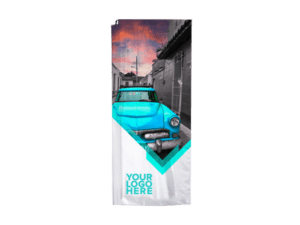 The Banner Flag Fabric Only showcases a vintage blue car on a street, set against a vibrant pink and orange sunset sky. The lower section includes a modern geometric design with room for a custom logo.