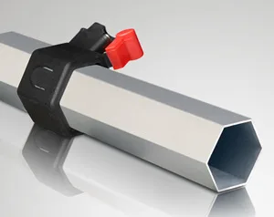 A hexagonal metal pipe, resembling the sturdy frame of a 10 x 10 canopy, with a black bracket attached, featuring a red lever on top, isolated on a reflective surface.