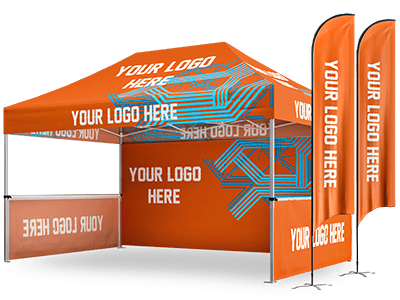 An orange 10x15 pop up canopy tent with Your Logo Here adorns the canopy and side panels. Flanking it are two standing banners echoing the same text. This setup is crafted for branding and marketing events, ensuring your presence stands out in style.