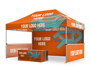 An orange 10'x15' Expo Plus Package tent with the text Your Logo Here printed multiple times, featuring blue geometric designs and including a matching table cover.