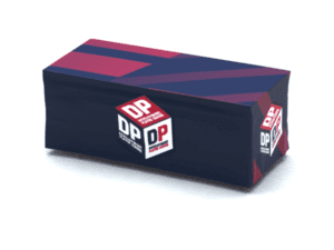 The package is a rectangular tablecloth wrapped in a dark blue wrapper adorned with red and white geometric designs. Prominently displayed on various sides are the letters DPL, indicating branding or logo design.