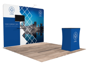 The 10'x10' Quick-N-Fit Booth - Package #1111 includes a branded backdrop featuring a cityscape design with geometric patterns, complemented by a small counter with matching branding and flooring that mimics a wood texture.