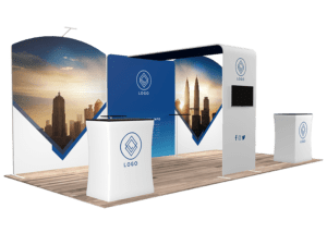 The 10'x20' Quick-N-Fit Booth - Package #1203 showcases a modern minimalist design, complemented by cityscape graphics, podiums with a central logo, and a screen display. It includes branded walls and features social media icons on the light wood floor in the foreground.