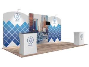 Introducing the 10'x20' Quick-N-Fit Booth - Package #1206: This stunning trade show booth display is centered around a backdrop featuring a captivating cityscape image accented by striking blue geometric patterns. It includes two elegantly designed white stands, each showcasing your company's logo on either side. Completing the modern look is a wooden floor that infuses warmth into the overall design.