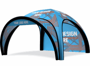 The 17x17 Printed Inflatable Air Dome Tent is blue with black supports and geometric orange patterns, featuring customizable text areas labeled YOUR LOGO HERE and YOUR DESIGN HERE.
