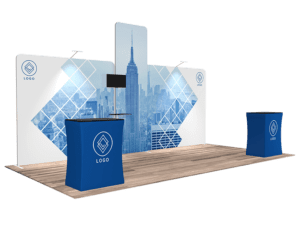 Introducing the 10'x20' Quick-N-Fit Booth - Package #1210: Impress at your next trade show with a captivating cityscape backdrop showcasing a towering building. This booth package features a central display, two counters adorned with your logo designs, and overhead lighting. The spacious wooden flooring offers an inviting area for interaction.