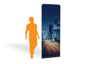 The 3x 7.5 Tension Banner w/ Hardware showcases a cityscape with skyscrapers and car light trails, complemented by an orange silhouette of a person walking to illustrate scale.