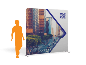 A 10x7.5 tension wall banner with a cityscape design and Your Logo Here text on the right, featuring an orange silhouette of a person walking on the left for scale comparison.