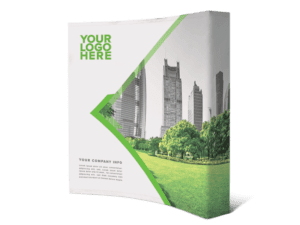 The 8x8 Printed Pop-Up Wall - Straight features a grayscale cityscape with skyscrapers and a green park. A diagonal green line adds contrast, YOUR LOGO HERE is at the top, and theres placeholder text for company info below.