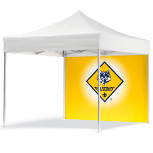 A transparent 10 BSA pop-up canopy tent with a yellow back panel displaying the Cub Scouts logo, including a wolf and fleur-de-lis emblem in a diamond shape.