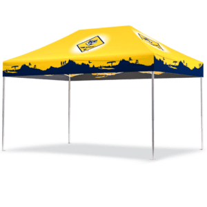 The BSA – 10’x15′ Custom Printed Tent is yellow with silhouetted city skyline graphics in dark blue along the edges, supported by four metallic poles. It features a shadow underneath and a central logo on the top surface.
