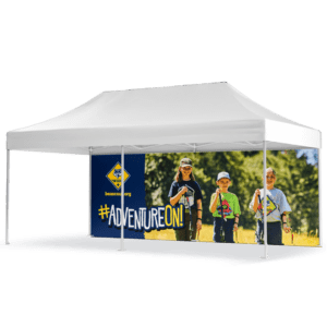 A white canopy tent wall showcases three children in scout uniforms with walking sticks, a vibrant outdoor backdrop, the slogan #ADVENTUREON!, and the web address beascout.org. Product: BSA - 15 Tent Wall - Prepared For Life (Copy).