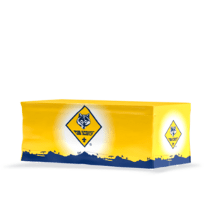 A rectangle-shaped table has a BSA-fitted table cover in bright yellow, fully printed with the Cub Scouts logo, showing a wolfs face inside a diamond shape at the center and side, with a shadow beneath the table.