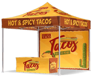 Yellow taco stand with a canopy reading “HOT & SPICY TACOS.” The booth and backdrop feature taco images, bold “Tacos” text, and a cactus illustration, all in bright, festive colors.