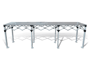 A metallic folding table with a perforated rectangular top and crisscross support structure, standing on six legs with flat circular feet.