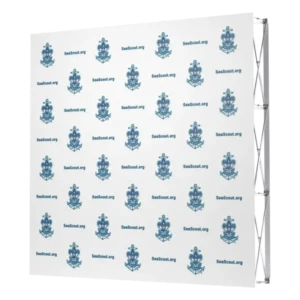 A step and repeat banner featuring repeating Sea Scout logos and the text SeaScout.org on a white background, displayed on a metal frame.