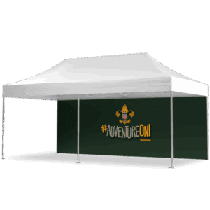 A white outdoor canopy tent with a dark green back wall displaying the Boy Scouts logo and the text #AdventureOn! beascout.org in yellow and white.