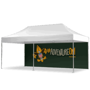 A white outdoor canopy tent with a dark green backdrop featuring the Boy Scouts of America logo and the text #ADVENTUREON! beascout.org in bold yellow and white letters.