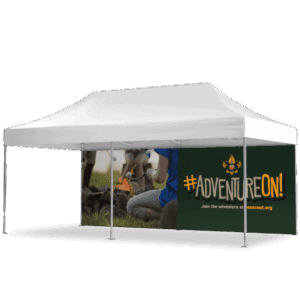 A white outdoor canopy tent with a banner showing kids roasting marshmallows over a campfire. The banner features the Boy Scouts logo and reads #ADVENTUREON! Join the adventure at beascout.org.