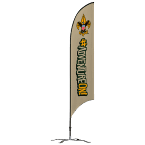 A beige vertical flag with the Boy Scouts fleur-de-lis logo at the top and large text reading #ADVENTUREON! in green and yellow, standing on a metal base.