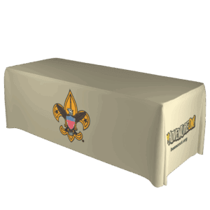 A beige tablecloth featuring the Boy Scouts of America fleur-de-lis emblem on the front and a Scout Me In logo with the website beascout.org on the side.
