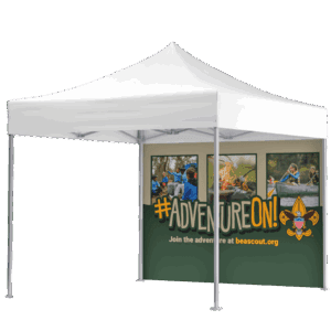 A white outdoor event canopy with a green banner showing photos of kids doing outdoor activities, the text #ADVENTUREON! and the Boy Scouts of America logo and website beascout.org.