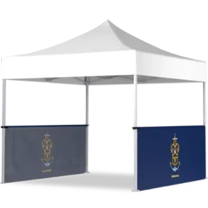 A white canopy tent with two navy blue side panels, each featuring a gold and blue anchor and crown emblem. The tent is open on two sides and has a peaked roof.