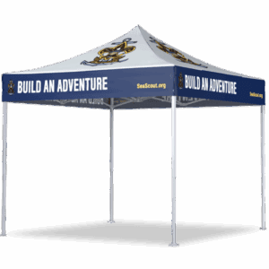 A blue and white outdoor canopy tent with BUILD AN ADVENTURE and SeaScout.org printed on the sides, along with an anchor and ships wheel logo on the top corners.