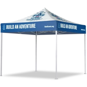 A blue and white outdoor canopy tent with the words BUILD AN ADVENTURE and SeaScout.org printed on the valance, along with a nautical anchor logo on the top.