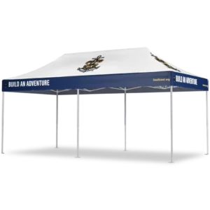 A blue and white canopy tent with the phrase Build an Adventure and a nautical emblem on the roof, supported by six metal legs.