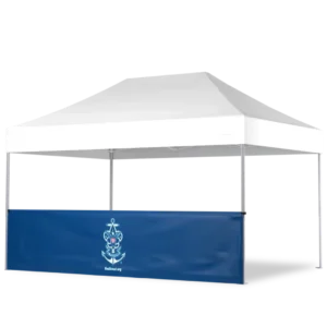 A white canopy tent with four legs and a blue banner attached to the front, featuring a nautical anchor emblem and the text SeaGuard.org in white.