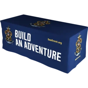 A blue table cover with the Sea Scouts logo, the words BUILD AN ADVENTURE in large white letters, and the website SeaScout.org printed on it.