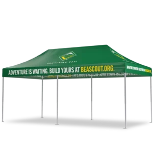 A green event canopy tent with the words ADVENTURE IS WAITING. BUILD YOURS AT BEASCOUT.ORG. printed along the top edge and the Venturing BSA logo on the roof panels.