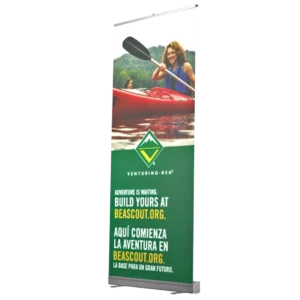 A banner shows a smiling youth kayaking, with text promoting Venturing BSA: “Adventure is waiting. Build yours at BeAScout.org. Aquí comienza la aventura en BeAScout.org. La base para un gran futuro.”.
