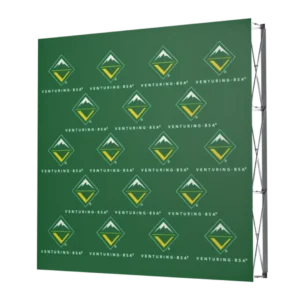 A green event backdrop featuring repeated Venturing BSA logos and the text VENTURING, BSA in yellow, with a partial view of the metal frame on the right side.