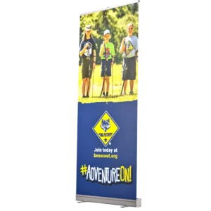 A banner shows three kids in Cub Scout uniforms outdoors. The Cub Scouts logo is below them, along with the text “Join today at beascout.org” and the hashtag “#AdventureOn!” on a blue background.