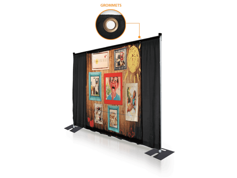 The 10x8 Printed Tradeshow Backdrop Fabric Only features a collage of framed pictures on a wooden background with black side curtains, plus an inset showing a close-up of a metal grommet at the top edge.