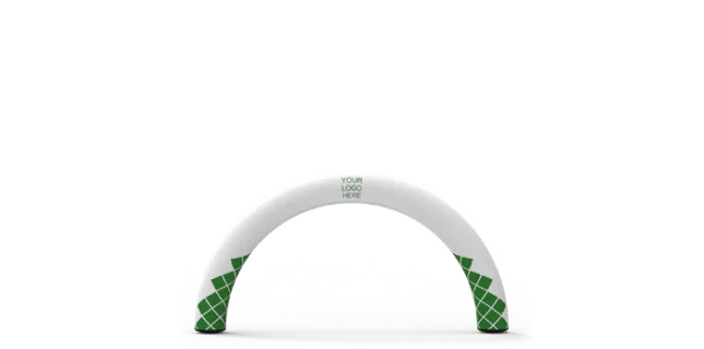 A white inflatable arch with green patterned bases stands on a flat surface. The center of the arch displays the text YOUR LOGO HERE.