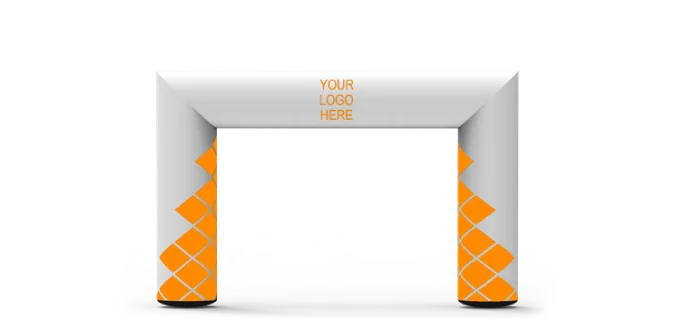 An inflatable archway with a blank area labeled YOUR LOGO HERE on top, featuring a white background with orange geometric patterns on the sides, placed on a gray surface.
