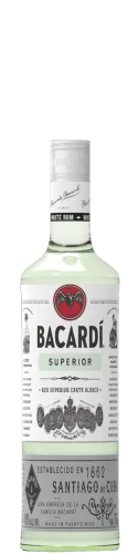 A clear glass bottle of Bacardi Superior white rum with a silver cap, featuring the brands bat logo and various black and silver design elements on the white label.