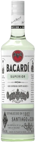 A clear glass bottle of Bacardi Superior white rum with a white label, red bat logo, and black and green text. The label mentions its Cuban heritage and the establishment year, 1862.