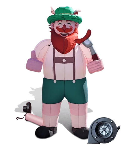 An inflatable figure of a smiling man with a red beard, green hat, lederhosen, and suspenders, holding a sausage and giving a thumbs-up. A fan for inflating the costume is visible at his feet.